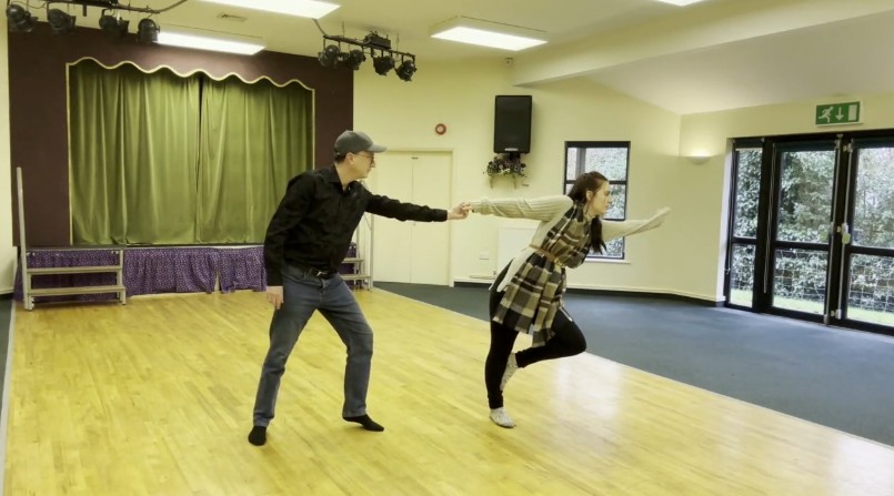 The village hall dance floor. Wooden sprung. Two dancers in pose for start of song.